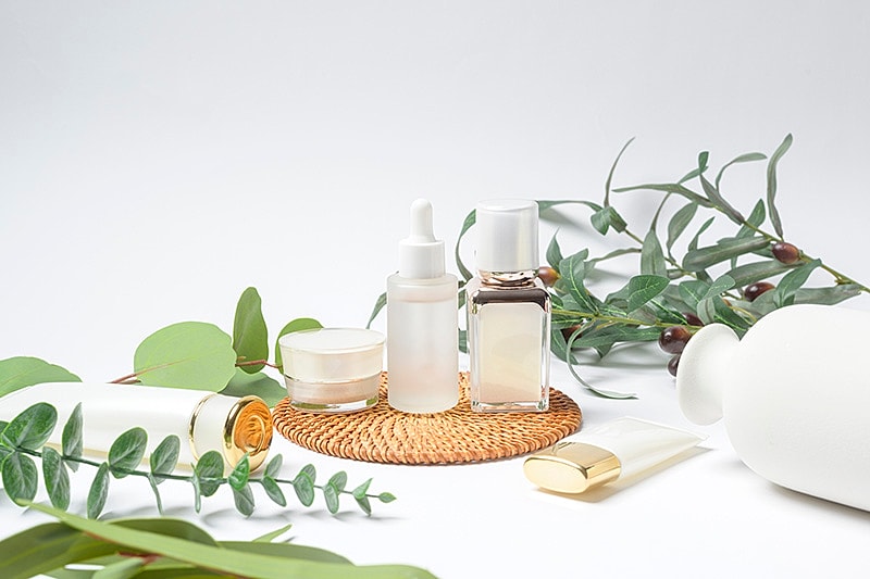 Skincare products on a wooden table.