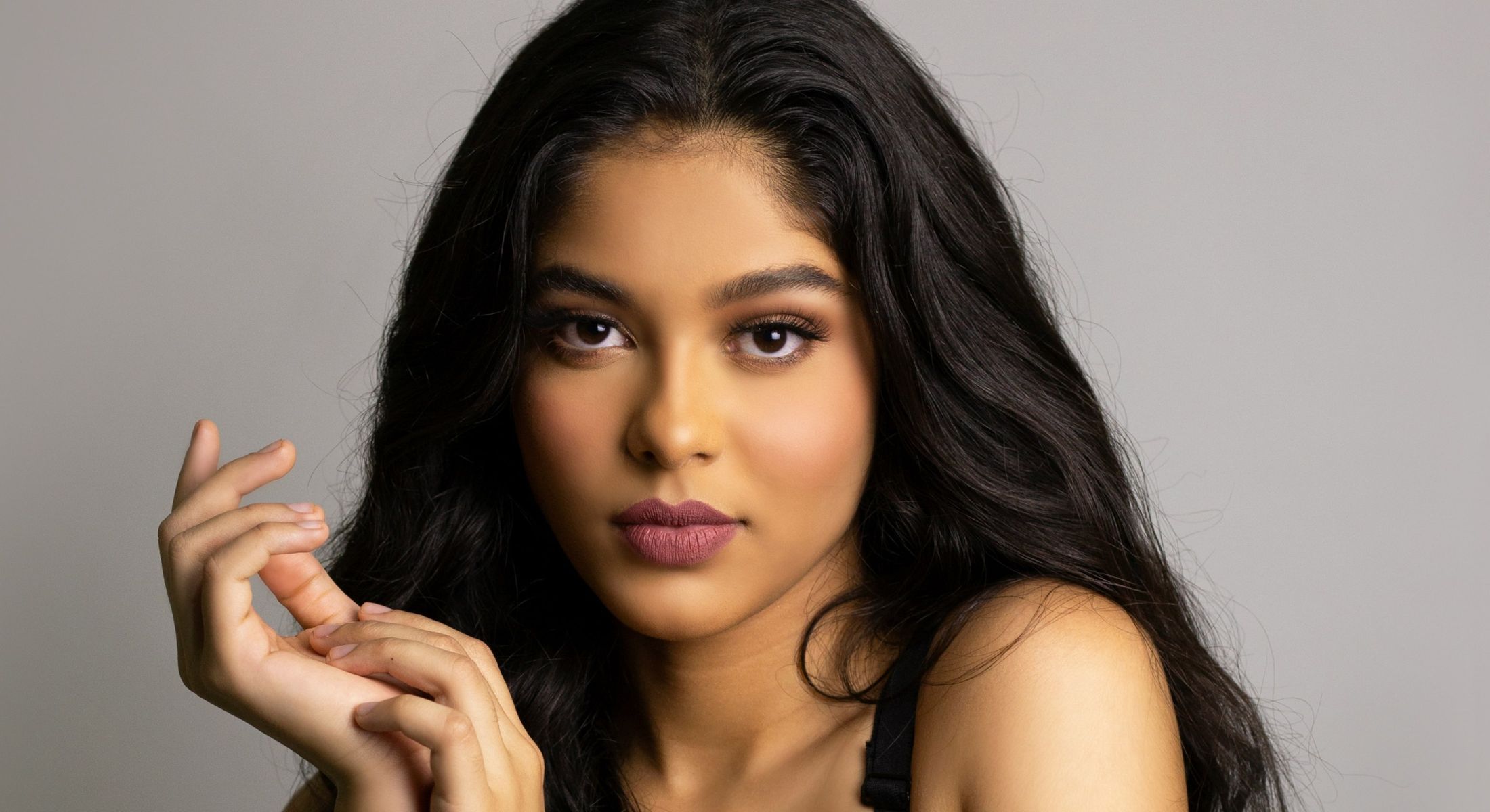 denver eyelid lift model with black hair